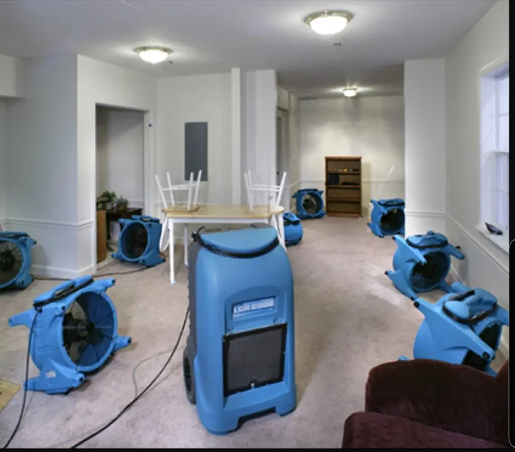 Air movers and dehumidifier setup for Water Extraction & Removal in Fayetteville